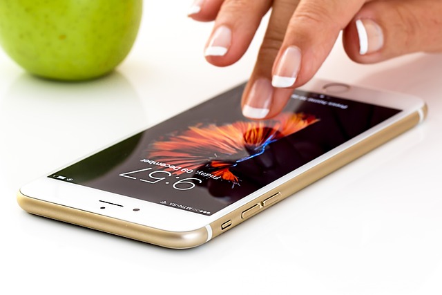 Apple Pay Pending - Explained 3 Finger tapping on an iPhone screen — mobile payment app / touch interaction close-up