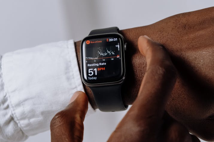 Apple Watch Warranty - Questions Answered 1 Apple Watch showing resting heart rate 51 BPM on wrist