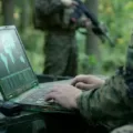 Military Operation in Action, Soldiers Using Military Grade Laptop ...