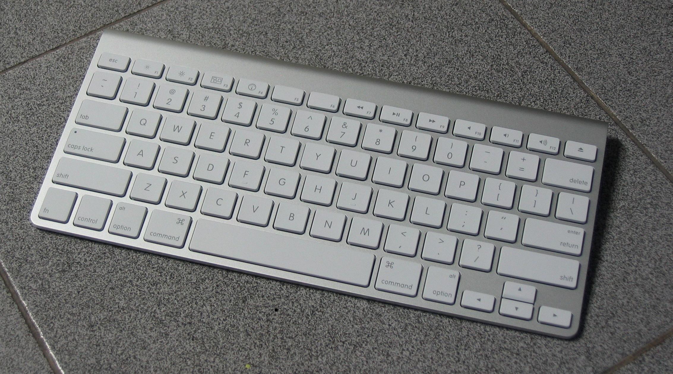 how to open a mac keyboard for batteries