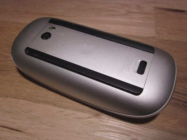An upside down mouse on a table.