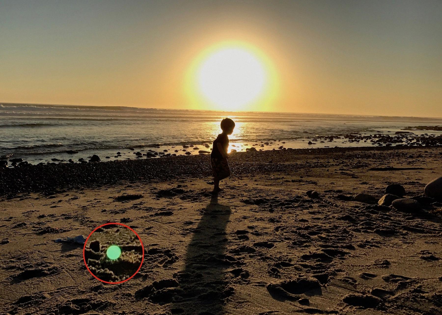 how to get rid of green dot on iphone camera