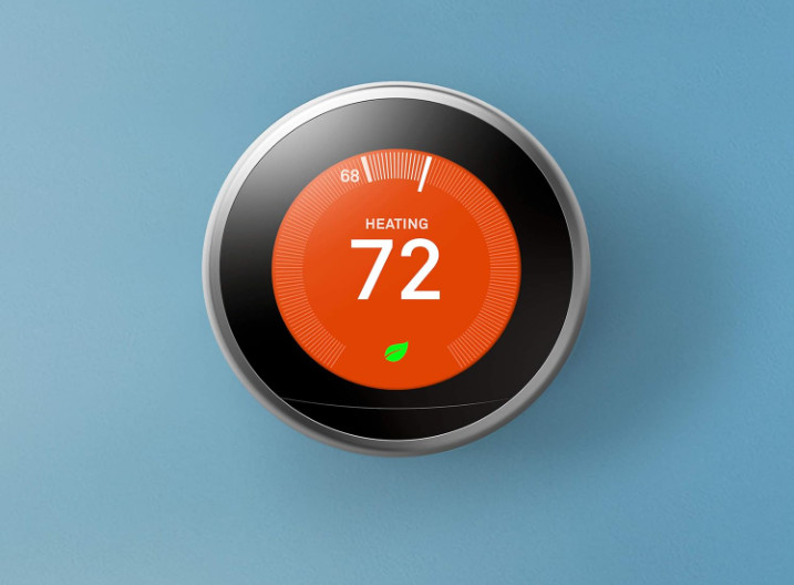 Close up of a Nest thermostat.